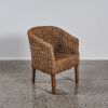 A Wicker/Seagrass Single Chair with Teak Legs