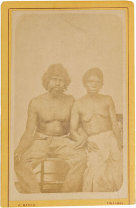 ALFRED WREN, MELBOURNE Aboriginal man and woman sitting with linked arms, man has chest lines