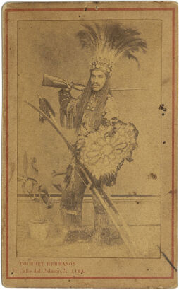 COURRET HERMANOS, LIMA Peru - Indigenous Indian man with feather headdress and rifle