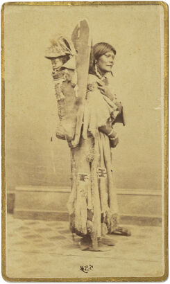 UNKNOWN PHOTOGRAPHER Pacific North West Indian woman in buckskin with baby in cradle board