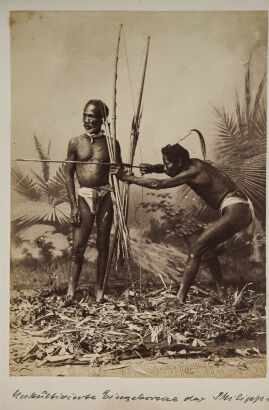 UNKNOWN PHOTOGRAPHER Two Philippine Negrito hunters with bow and arrow and poison sticks