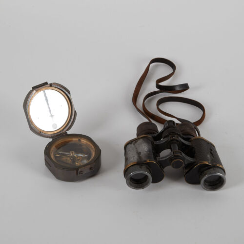 An Old Pair of Binoculars and a Compass