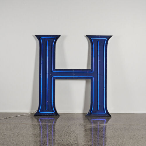 A Large Letter 'H' Blue Neon Sign