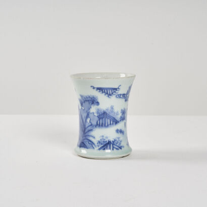 A Chinese Blue And White Brush Pot decorated with feature scenes of young boys at play (Kangxi Nian Zhi Mark)