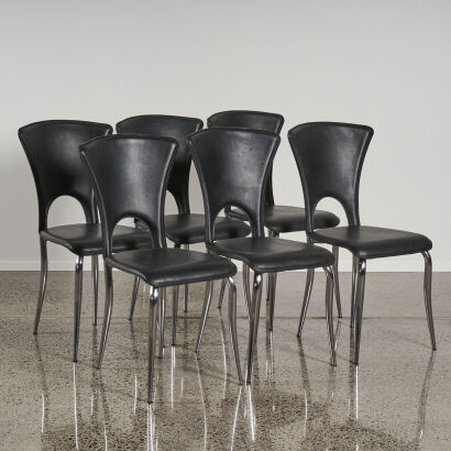 A Suite Of Italian Black Leather Dining Chairs