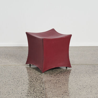 A Red Contoured Italian Stool By Inline