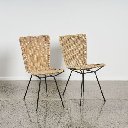 A Pair Of Retro Cane Chairs