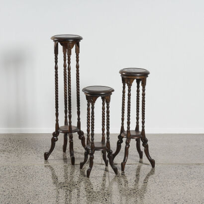 A Set Of Three Bali Twist Plant Stands