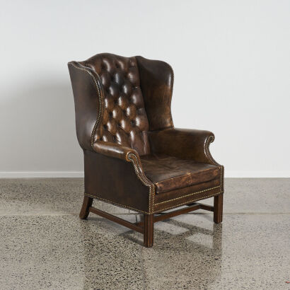  An Antique Leather Wingback Armchair  