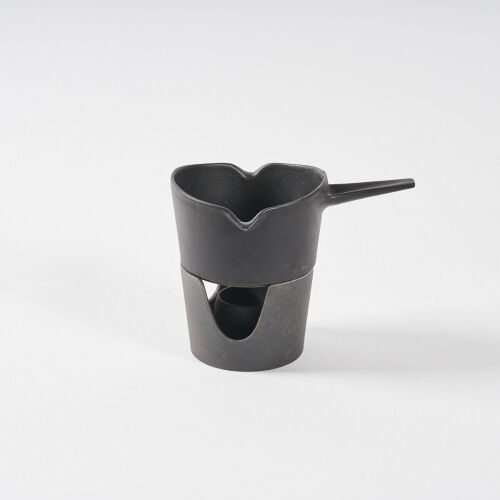 A Cast Iron Danish Sauce Warmer By Lax Design