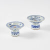 A Pair of Small Chinese Qing-Dynasty Blue and White Standing Plates