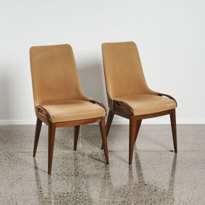 A Pair Of Velvet Covered Mid Century Chairs