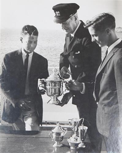 GEORGE SILK Harold Vanderbilt presents Cup to Young Sailors