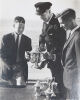GEORGE SILK Harold Vanderbilt presents Cup to Young Sailors