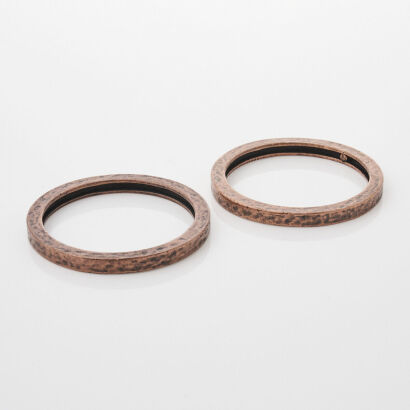 Two Karl Lagerfeld Copper Bangles
