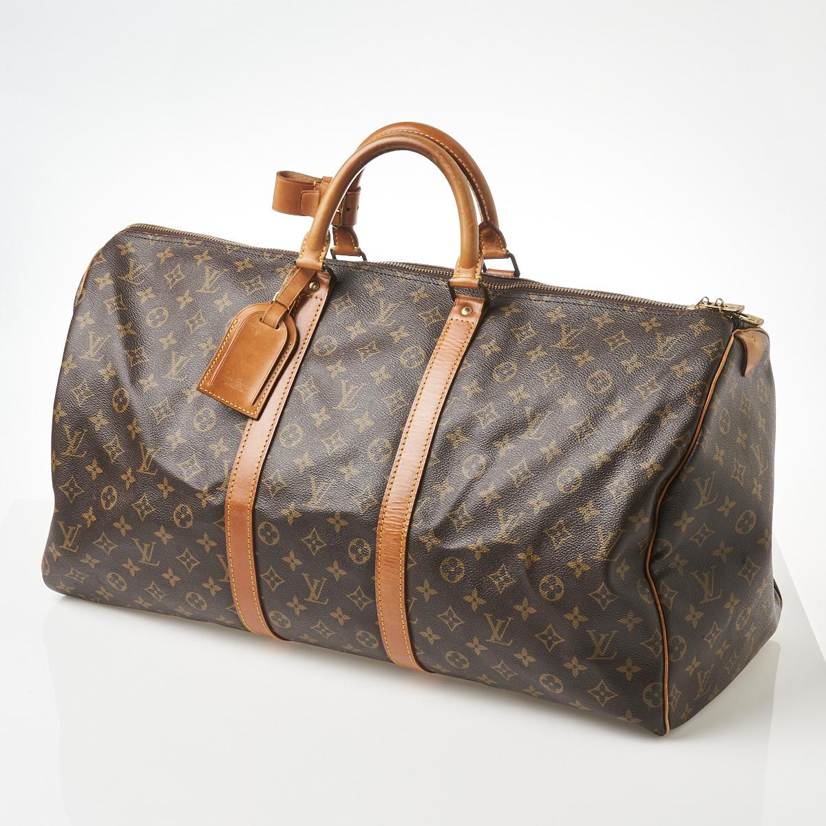 Sold at Auction: Louis Vuitton Epi Leather Keepall 55 Duffle