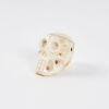 A Zora Bell-Boyd Hand Carved Bone Skull Pendant - 2