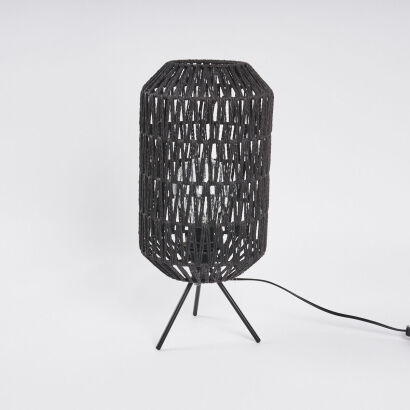 A Wicker Bedside Lamp With Tripod Base