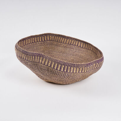 A Woven Plant Fibre Basket