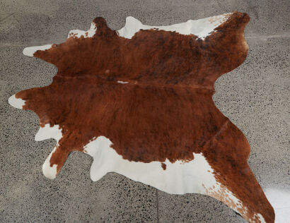 A Large Cow Hide Rug