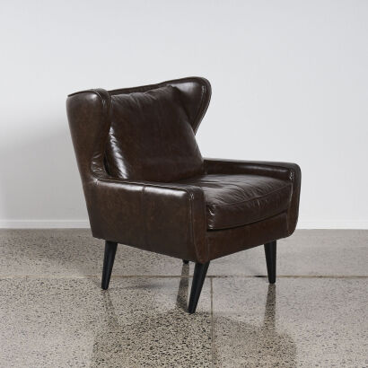 A Brown Wingback Armchair
