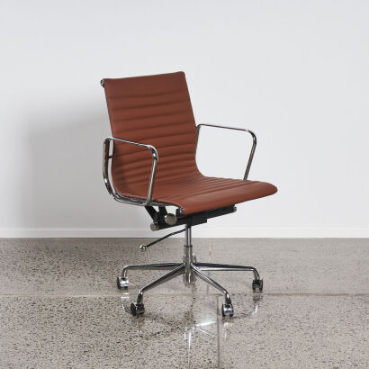 An Eames Replica Mid Back Chair In Tan