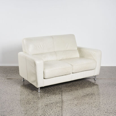 A Contemporary Two-Seater White Leather Couch