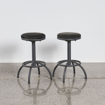 A Pair Of Industrial Swivel Stools