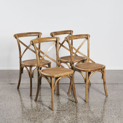 A Set Of Four Oak Cross Back Chairs