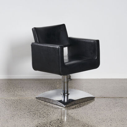A Black Leather Minimal Armchair