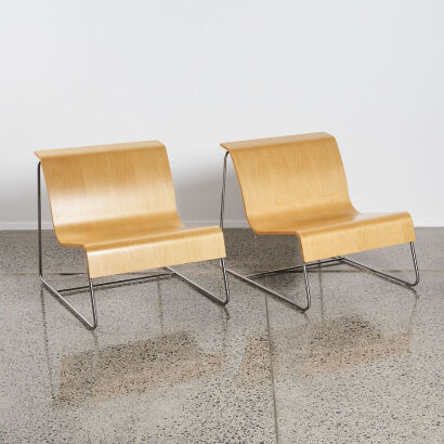 A Pair of Chromed Steel and Pressed Ply Chairs