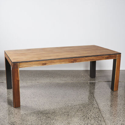 A Solid Teak With Black Trim Dining Table