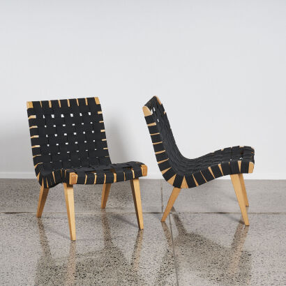A Pair Of Risom Style Lounge Chairs