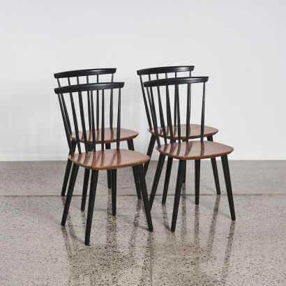 A Set of Four Scandinavian Spindle Back Dining Chairs