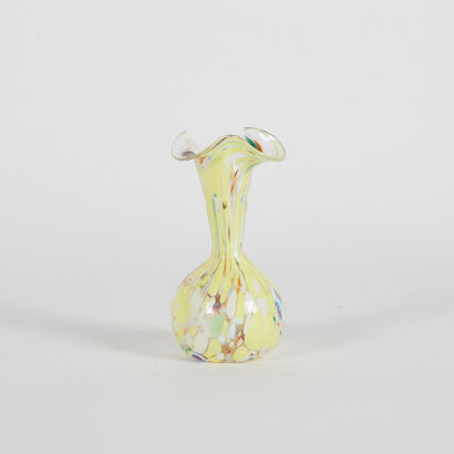 A Dappled Yellow And White Bud Vase With Wavy Top