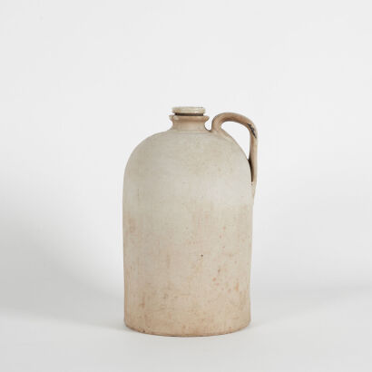 A Winchester Works Ceramic Demijohn