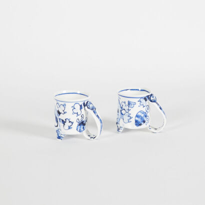 A Pair of Aaron Scythe Hand-Painted Crazy Cat Mugs