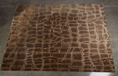 A Large Woolen Rug With A Geometric Pattern