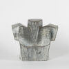 A Brutalist Metal Bust