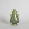 A Carved Chinese Qing-Dynasty Jade Two-Handled Lidded Vase