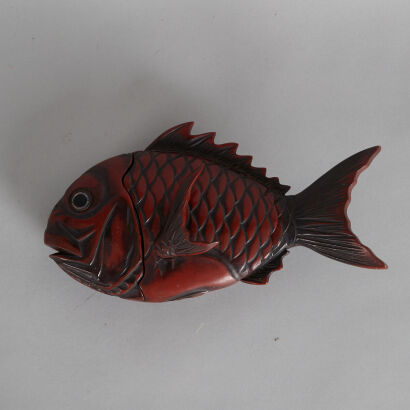 A Chinese Red-Lacquered 'Fish' Lidded Box