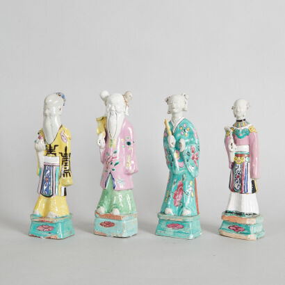 A Group of Four Chinese Mid Qing-Dynasty Famille Rose Figures