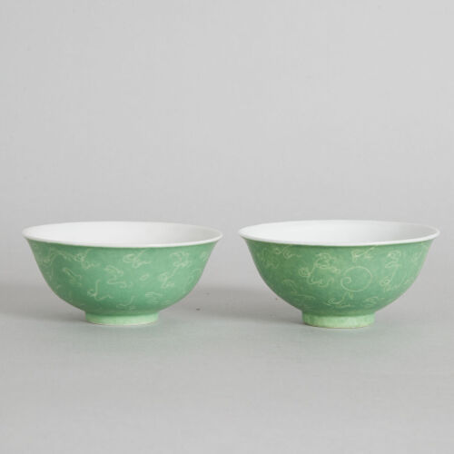 A Pair of Small Chinese Qing-Dynasty Celadon-Glazed Bowls carved with dragon pattern (Da Qing Qianlong Nian Zhi Mark)