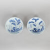 A Pair of Chinese Mid Qing-Dynasty Blue and White 'Bamboo and Rock' Dishes (Da Qing Qianlong Nian Zhi Mark)