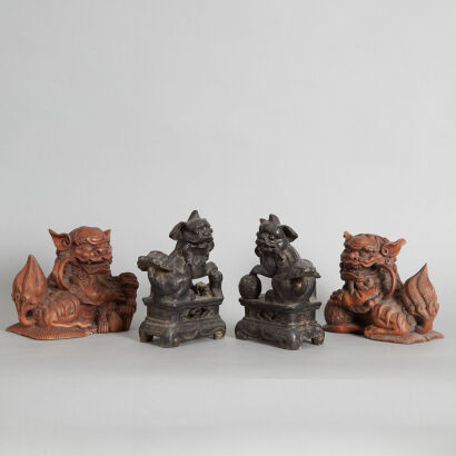 A Pair of Chinese Hardwood Figures of Lion & A Pair of Pottery Figures of Lion