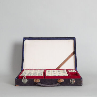 A Set of Carved Chinese Bone Mahjong (comes with chips)