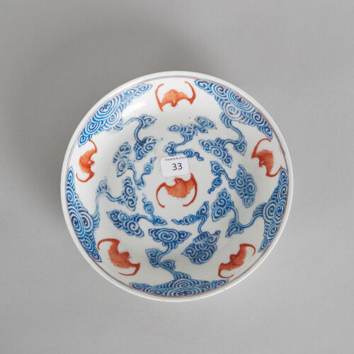 A Chinese Qing Dynasty Blue Enamel Iron-Red 'Bat' Saucer with Cloud Pattern