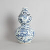 A Chinese Blue and White 'Dragon and Phoenix' Double-Gourd Vase