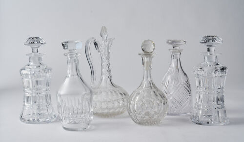 Five Crystal Liqueur Decanters and One Wine Decanter