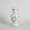 A Chinese Late Yuan/Early Ming Dynasty Blue and White Vase with two handles (repaired)